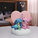 Figura iluminada enesco disney stitch y angel