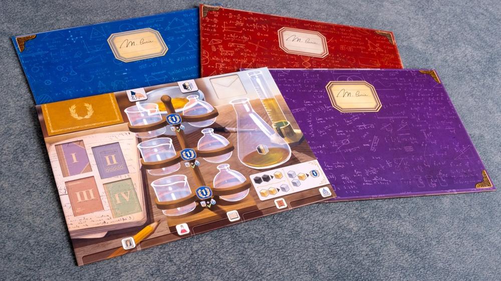 Juego de mesa tras los pasos de marie curie