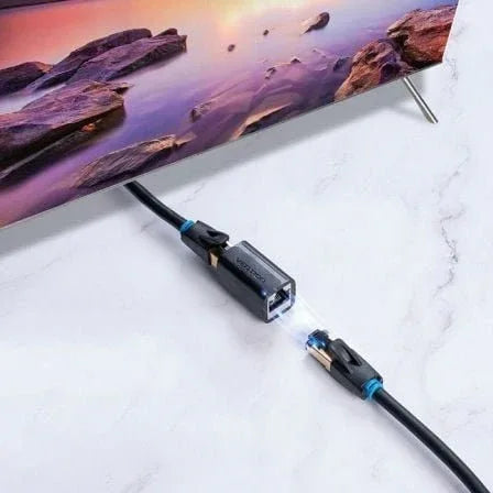 Adaptador Conector Vention RJ45 IPWB0 Cat.7 FTP/ RJ45 Hembra - RJ45 Hembra/ Negro - PixelPlaza